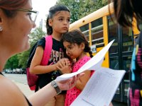 1009397793 ma nb HayMacFistDay  Students arrive for the first day of school at the Hayden McFadden Elementary School in New Bedford.  PETER PEREIRA/THE STANDARD-TIMES/SCMG : education, school, students